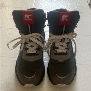 Sorel Brown and Gray Out and About boots with Red Logo